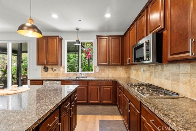 28321 Esplanada Dr, Valencia, CA 91354 - kitchen featuring a sink, appliances with stainless steel finishes, plenty of natural light, hanging light fixtures, and recessed lighting