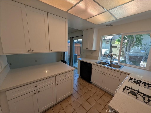 1266 Tarryglen Ln, San Dimas, CA 91773 - kitchen with a sink, black dishwasher, light countertops, and light tile patterned flooring