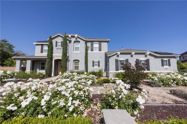 12920 Evermay Ct, Rancho Cucamonga, CA 91739 - view of front of home featuring stucco siding and stone siding
