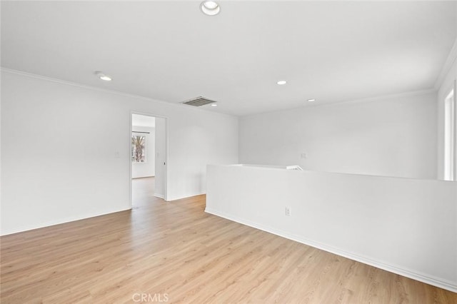 943 Solem St, Azusa, CA 91702 - unfurnished room with ornamental molding, recessed lighting, light wood-type flooring, and baseboards