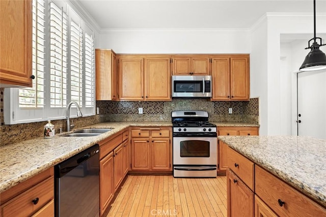 943 Solem St, Azusa, CA 91702 - kitchen with stainless steel appliances, a sink, light wood finished floors, light stone countertops, and crown molding