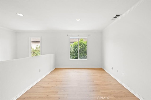 943 Solem St, Azusa, CA 91702 - empty room with ornamental molding, light wood-style flooring, baseboards, and recessed lighting