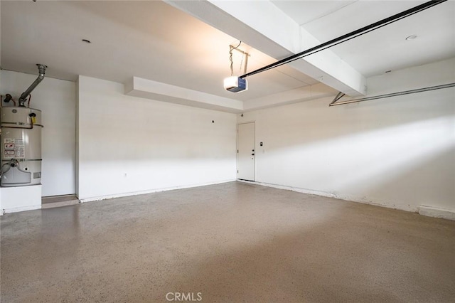943 Solem St, Azusa, CA 91702 - garage featuring a garage door opener and strapped water heater