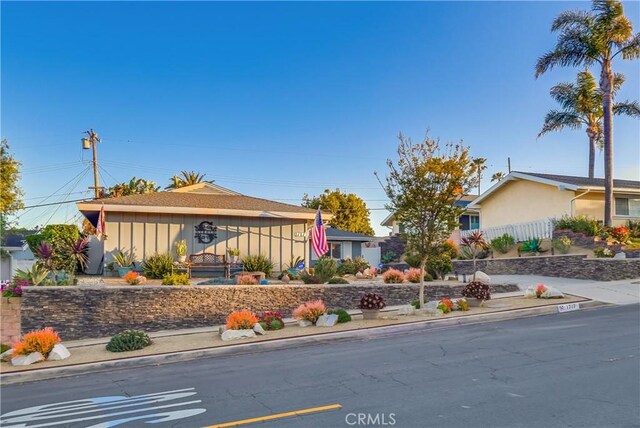 1717 Cumbre Dr, San Pedro, CA 90732 - view of front of home featuring board and batten siding and stucco siding