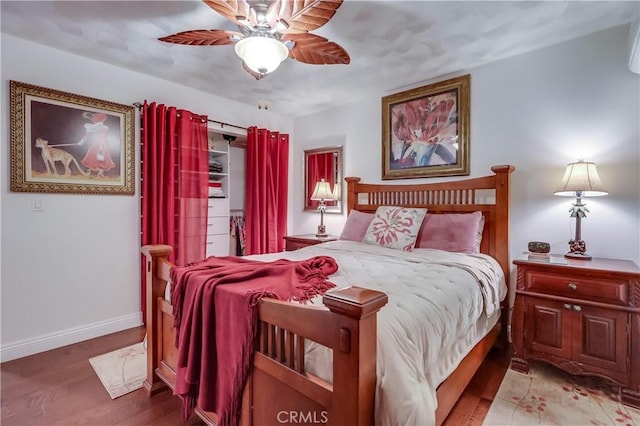1717 Cumbre Dr, San Pedro, CA 90732 - bedroom with wood finished floors, baseboards, and ceiling fan