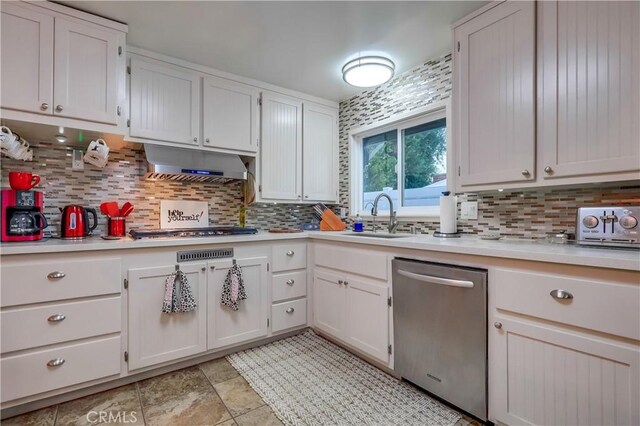 1717 Cumbre Dr, San Pedro, CA 90732 - kitchen featuring stainless steel dishwasher, under cabinet range hood, a sink, and backsplash
