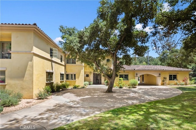 4204 Woodleigh Ln, La Canada Flintridge, CA 91011 - view of front of home with curved driveway and stucco siding