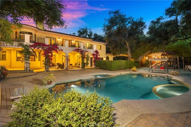 4204 Woodleigh Ln, La Canada Flintridge, CA 91011 - view of pool with a pool with connected hot tub and a patio area