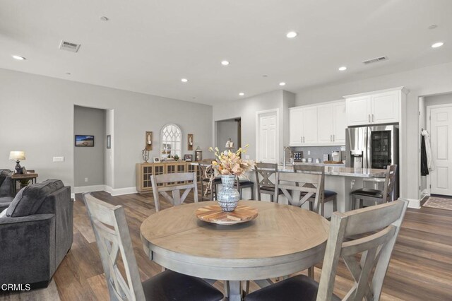 508 Autumn Path Ln, Santa Paula, CA 93060 - dining space featuring dark wood-style floors, baseboards, and recessed lighting