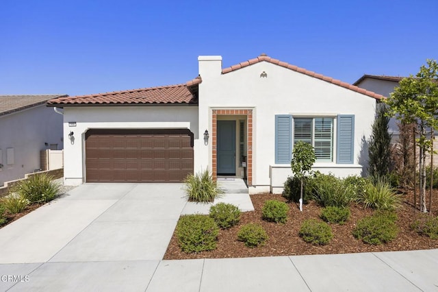 508 Autumn Path Ln, Santa Paula, CA 93060 - mediterranean / spanish-style house featuring a garage, stucco siding, driveway, and a tiled roof