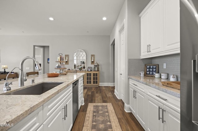 508 Autumn Path Ln, Santa Paula, CA 93060 - kitchen with a sink, appliances with stainless steel finishes, decorative backsplash, white cabinetry, and dark wood-style floors