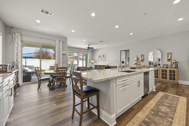 508 Autumn Path Ln, Santa Paula, CA 93060 - kitchen featuring a sink, stainless steel dishwasher, recessed lighting, dark wood-style floors, and a kitchen island with sink