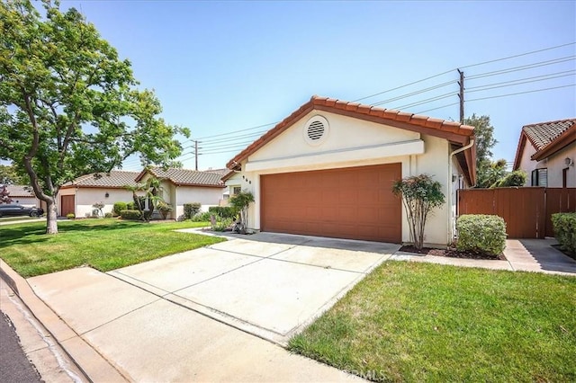 960 Via Serana, Upland, CA 91784 - view of front of home with stucco siding, concrete driveway, a tile roof, and a garage
