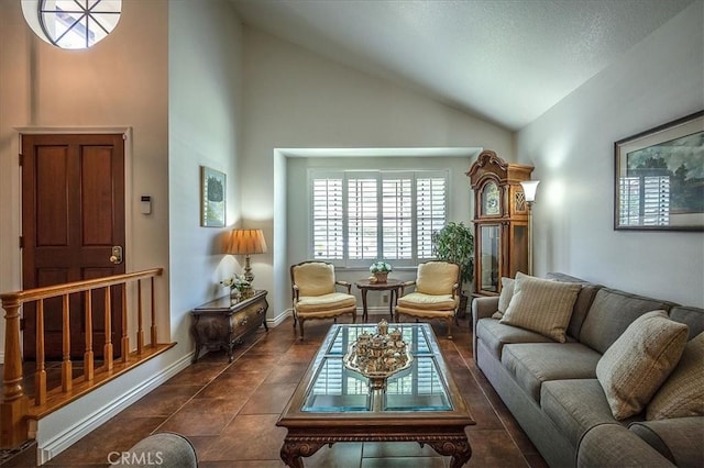 960 Via Serana, Upland, CA 91784 - living room featuring high vaulted ceiling and dark tile patterned floors