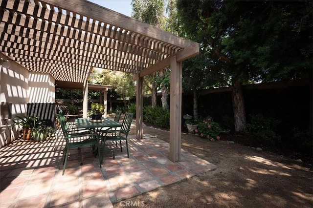 960 Via Serana, Upland, CA 91784 - fenced backyard with a pergola, a patio area, and outdoor dining space