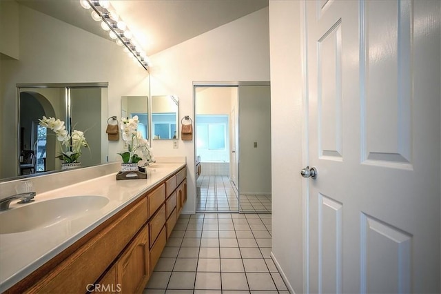 960 Via Serana, Upland, CA 91784 - bathroom featuring double vanity, tile patterned floors, and baseboards