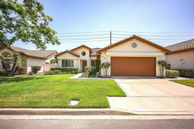 960 Via Serana, Upland, CA 91784 - mediterranean / spanish house featuring an attached garage, stucco siding, concrete driveway, a front lawn, and a tiled roof