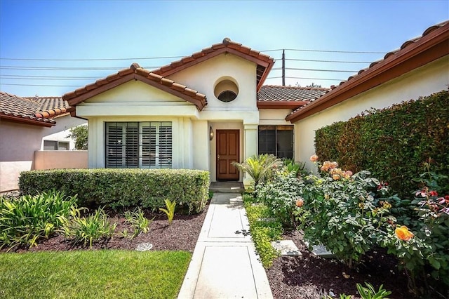 960 Via Serana, Upland, CA 91784 - view of front of house featuring a tile roof and stucco siding