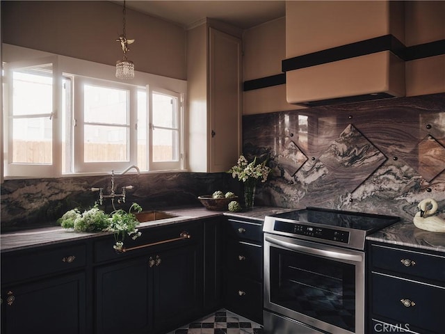 7148 Marshfield Way, Los Angeles, CA 90046 - kitchen featuring stainless steel electric range, decorative backsplash, dark cabinetry, and decorative light fixtures