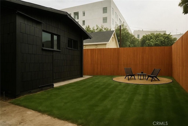 7148 Marshfield Way, Los Angeles, CA 90046 - fenced backyard featuring a fire pit