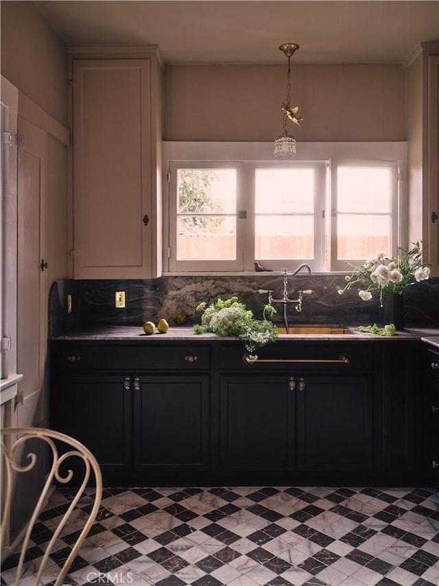 7148 Marshfield Way, Los Angeles, CA 90046 - kitchen featuring light flooring, pendant lighting, dark cabinetry, and dark countertops