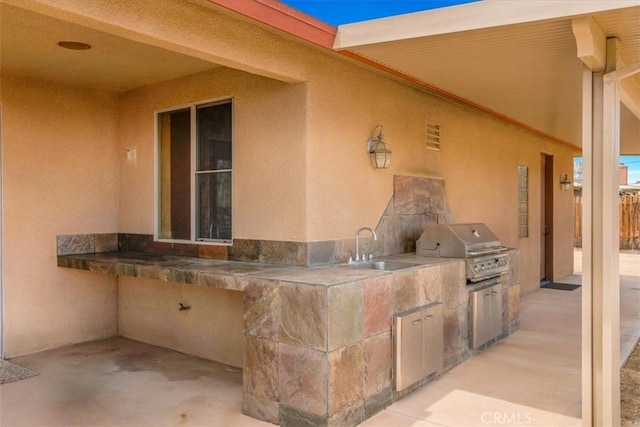57934 Juarez Dr, Yucca Valley, CA 92284 - view of patio / terrace featuring exterior kitchen and a sink
