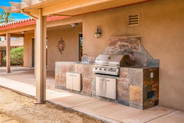 57934 Juarez Dr, Yucca Valley, CA 92284 - view of patio / terrace featuring an outdoor kitchen and a sink