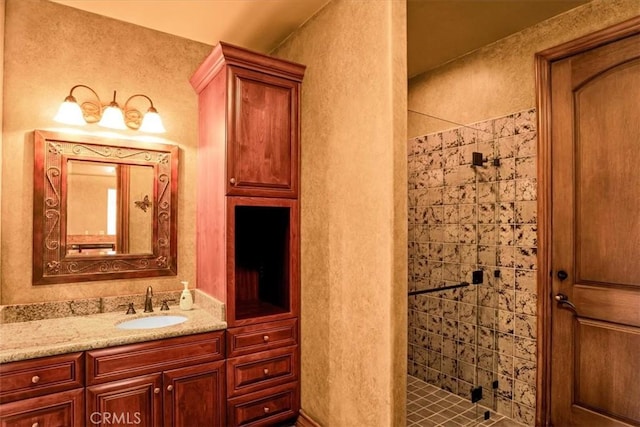 57934 Juarez Dr, Yucca Valley, CA 92284 - bathroom with a shower stall, vanity, and a textured wall