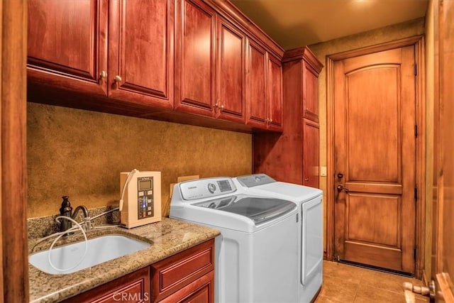 57934 Juarez Dr, Yucca Valley, CA 92284 - laundry room with cabinet space, separate washer and dryer, and light tile patterned flooring