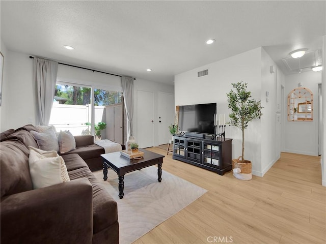 28839 Conejo View Dr, Agoura Hills, CA 91301 - living area featuring wood finished floors, attic access, recessed lighting, and baseboards