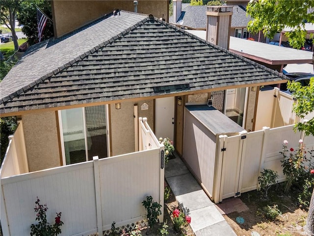 28839 Conejo View Dr, Agoura Hills, CA 91301 - view of property exterior with roof with shingles and stucco siding