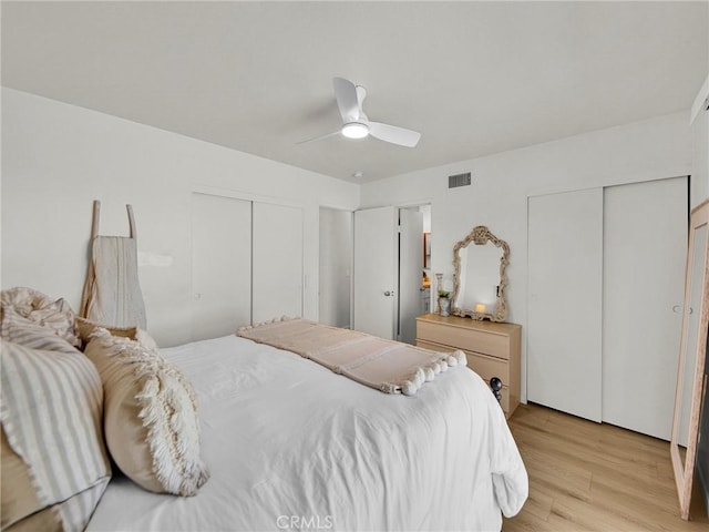 28839 Conejo View Dr, Agoura Hills, CA 91301 - bedroom featuring light wood finished floors, multiple closets, and a ceiling fan