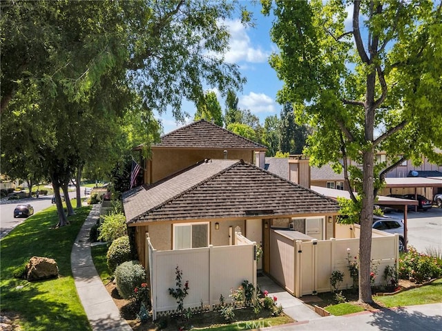 28839 Conejo View Dr, Agoura Hills, CA 91301 - view of front of property featuring a fenced front yard, stucco siding, and a shingled roof