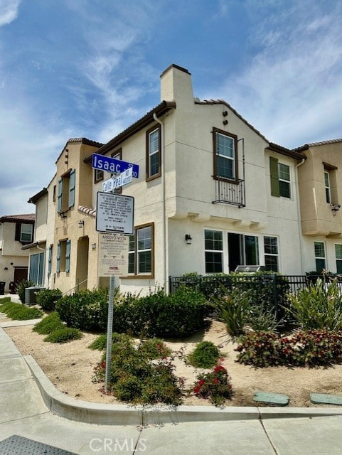 40265 Calle Real, Murrieta, CA 92563 - view of front of home with stucco siding and a chimney