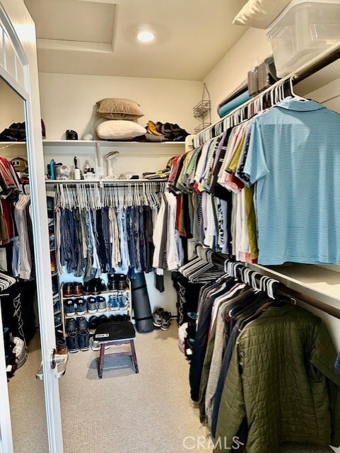 40265 Calle Real, Murrieta, CA 92563 - walk in closet featuring attic access and carpet flooring
