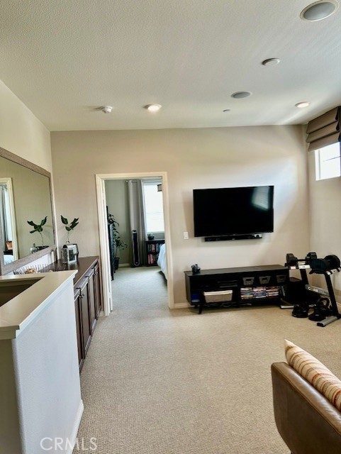 40265 Calle Real, Murrieta, CA 92563 - living room featuring light colored carpet and baseboards
