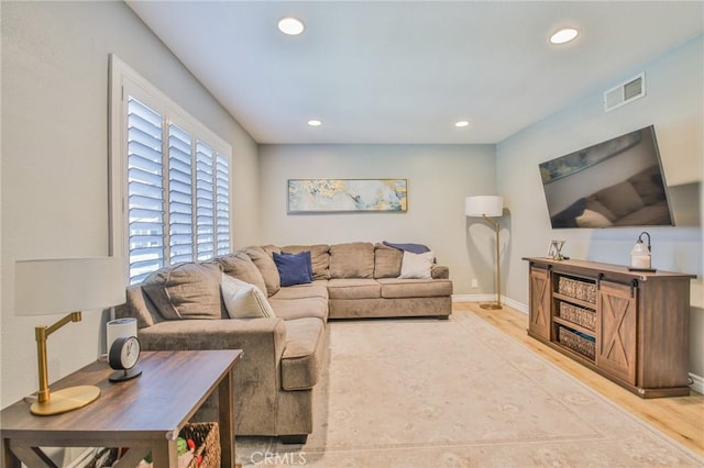 5427 E Pine Ridge Way Unit D, Anaheim, CA 92807 - living area featuring recessed lighting, light wood-type flooring, and baseboards