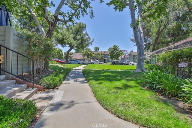 5427 E Pine Ridge Way Unit D, Anaheim, CA 92807 - view of green lawn featuring a residential view