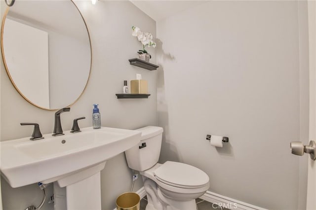 5427 E Pine Ridge Way Unit D, Anaheim, CA 92807 - half bath with baseboards and toilet