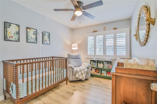 5427 E Pine Ridge Way Unit D, Anaheim, CA 92807 - bedroom with wood finished floors and ceiling fan