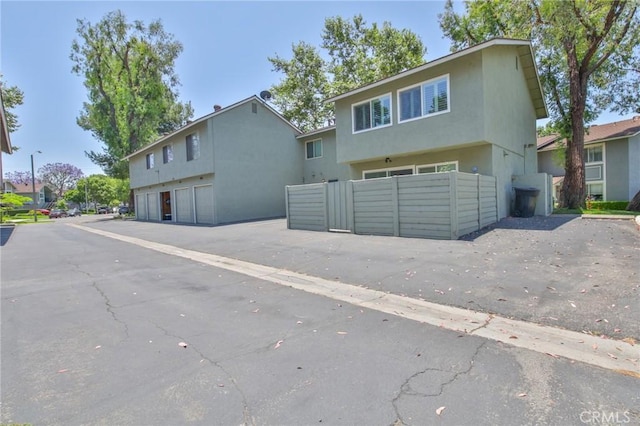 5427 E Pine Ridge Way Unit D, Anaheim, CA 92807 - multi unit property with stucco siding and a garage