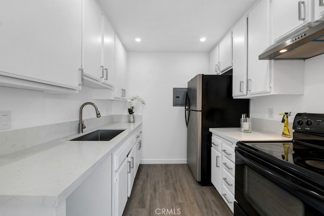 20930 Parthenia St Unit 206, Canoga Park, CA 91304 - kitchen with black range with electric cooktop, a sink, under cabinet range hood, recessed lighting, and dark wood finished floors