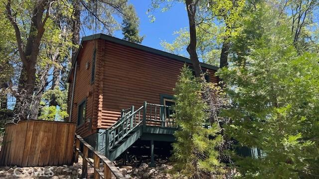 33796 Cedar Pines Ln, Green Valley Lake, CA 92341 - view of home's exterior featuring log exterior and a deck