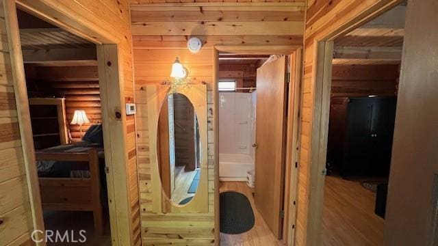 33796 Cedar Pines Ln, Green Valley Lake, CA 92341 - bathroom with wooden walls and wood finished floors