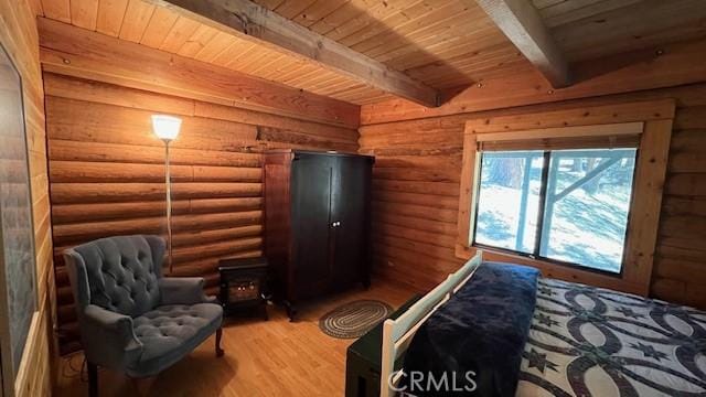 33796 Cedar Pines Ln, Green Valley Lake, CA 92341 - bedroom featuring wood ceiling with exposed beams, wood finished floors, and log walls