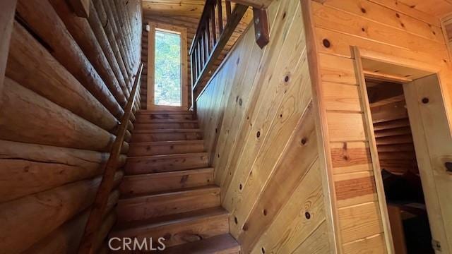 33796 Cedar Pines Ln, Green Valley Lake, CA 92341 - staircase with wood walls and log walls