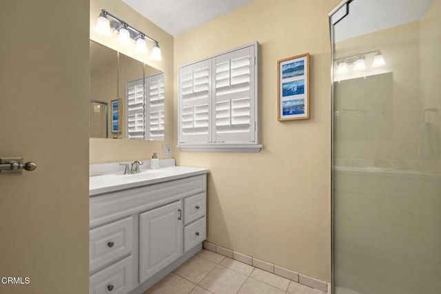 2156 Las Lunas St, Pasadena, CA 91107 - bathroom with vanity, tile patterned floors, and a shower