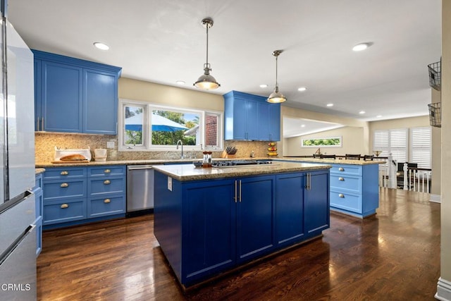 2156 Las Lunas St, Pasadena, CA 91107 - kitchen featuring blue cabinets, a kitchen island, stainless steel appliances, dark wood-style floors, and plenty of natural light