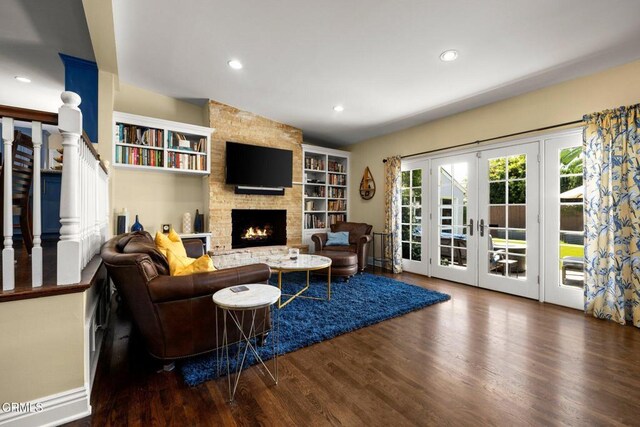 2156 Las Lunas St, Pasadena, CA 91107 - living room featuring a fireplace, wood finished floors, recessed lighting, french doors, and stairs