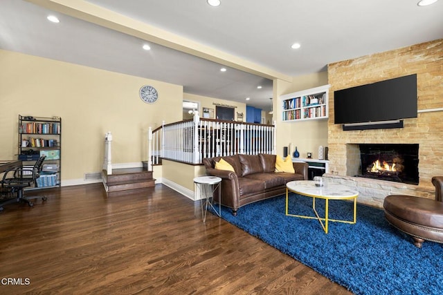 2156 Las Lunas St, Pasadena, CA 91107 - living area with wood finished floors, beamed ceiling, a large fireplace, a desk, and recessed lighting